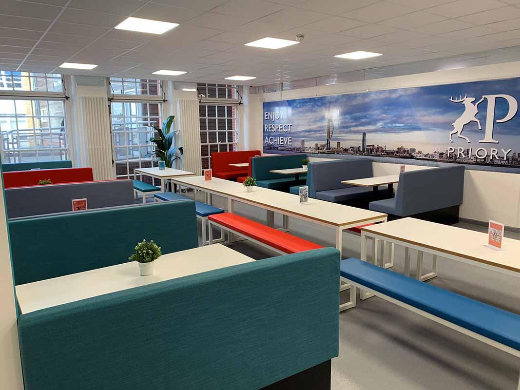 School Canteen with White Tables, Bright Benches & Booth Seating